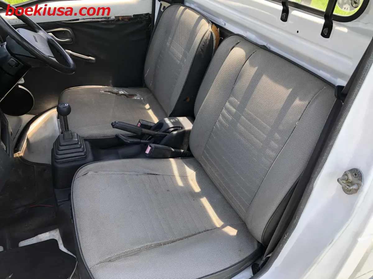 1991 Suzuki Carry Dump 4x4, a white Kei Truck, for sale at Boeki USA in Paterson, NJ (photo 11 of 20)