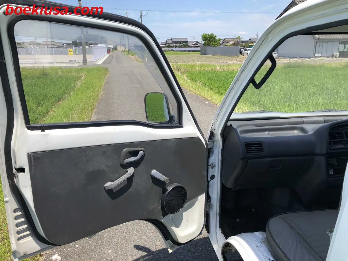 1991 Suzuki Carry Dump 4x4, a white Kei Truck, for sale at Boeki USA in Paterson, NJ (photo 9 of 20)