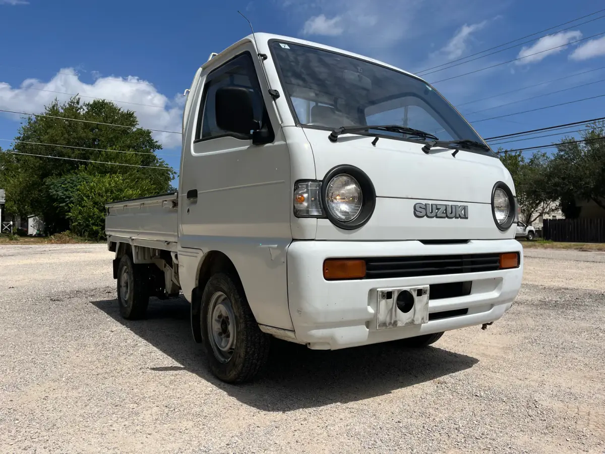 1992 Suzuki Carry, 4WD + AC, a Kei Truck, for sale at Sunshine Imports in Austin, TX (photo 1 of 10)
