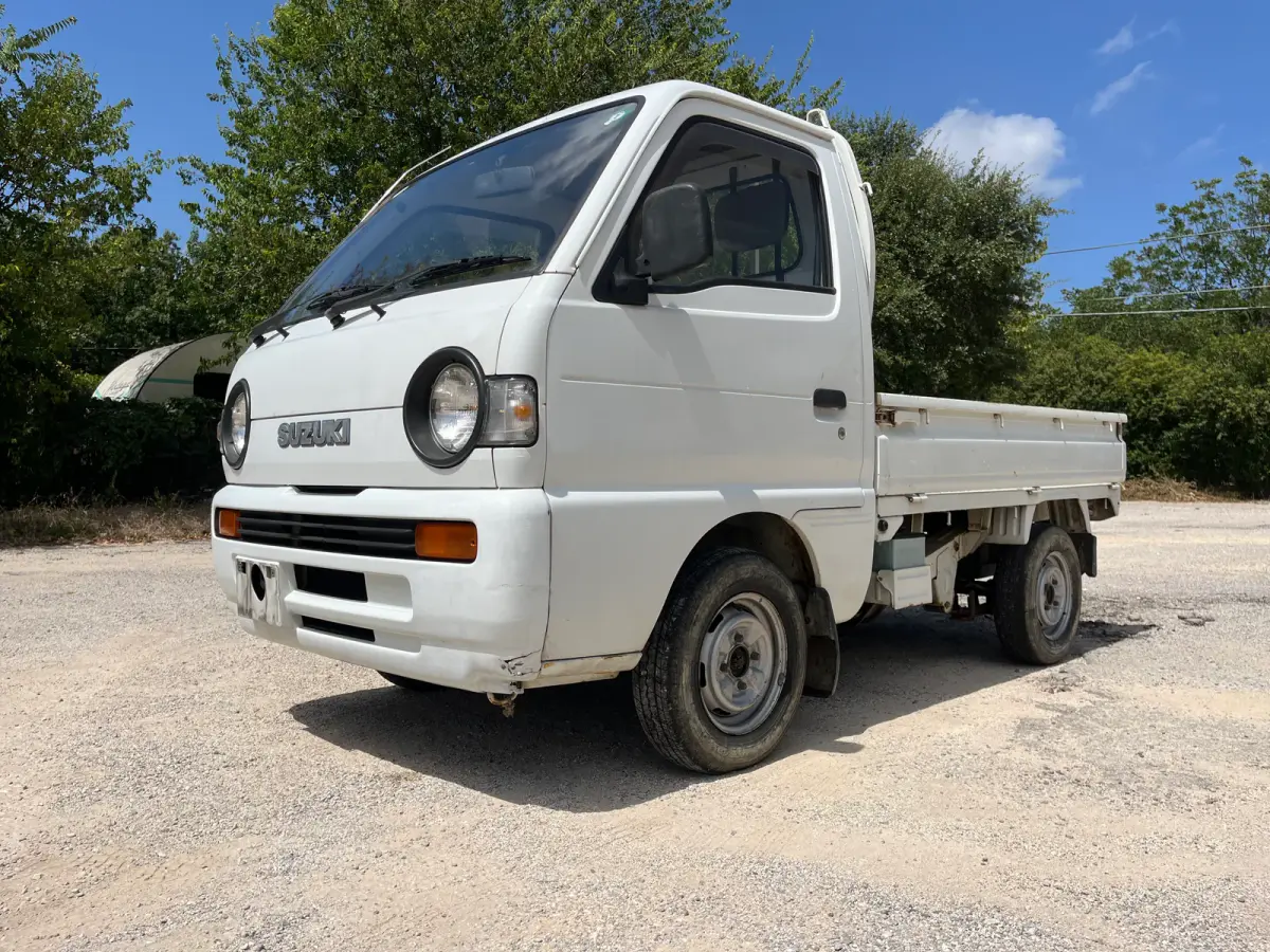 1992 Suzuki Carry, 4WD + AC, a Kei Truck, for sale at Sunshine Imports in Austin, TX (photo 2 of 10)