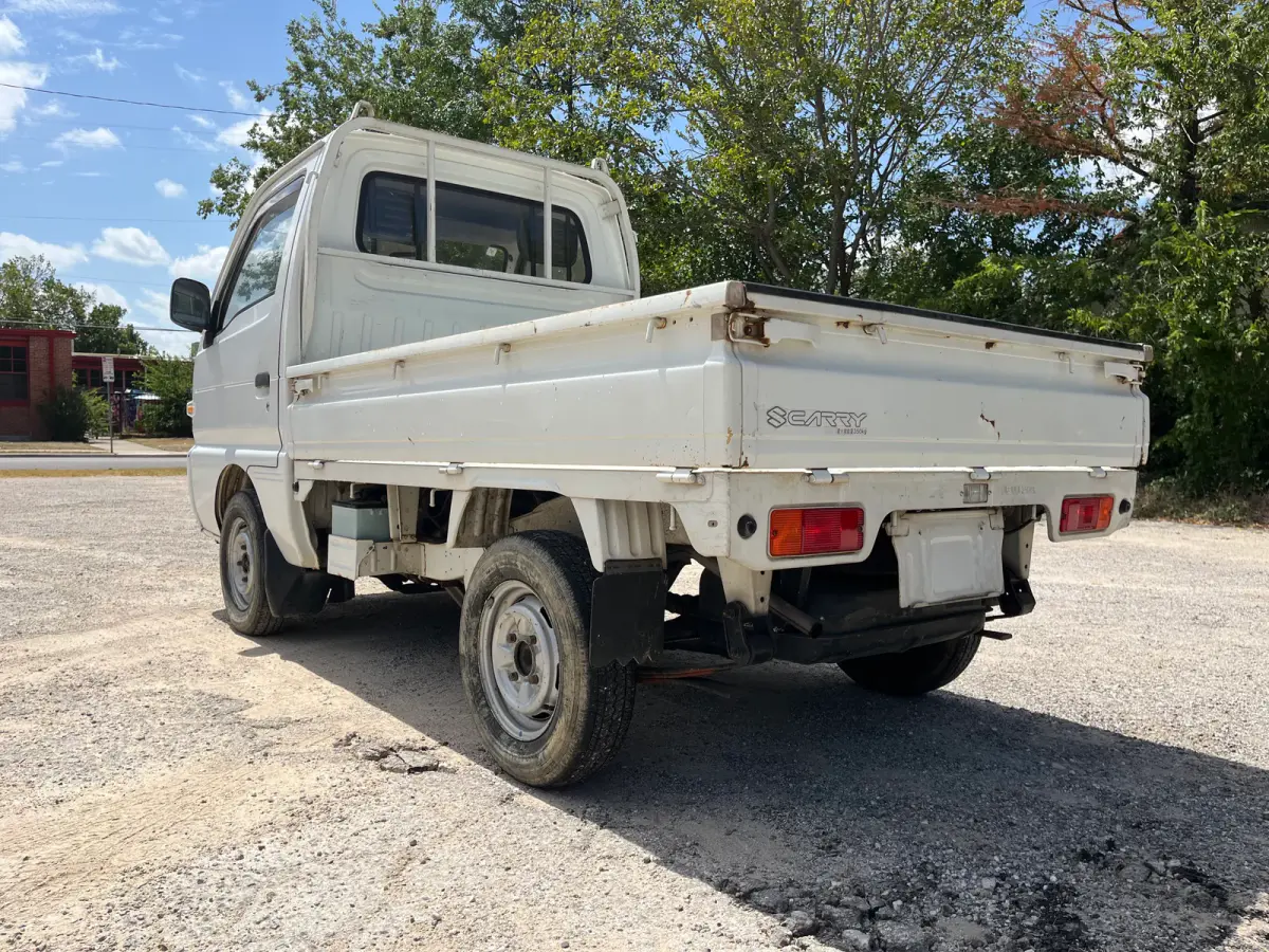 1992 Suzuki Carry, 4WD + AC, a Kei Truck, for sale at Sunshine Imports in Austin, TX (photo 3 of 10)