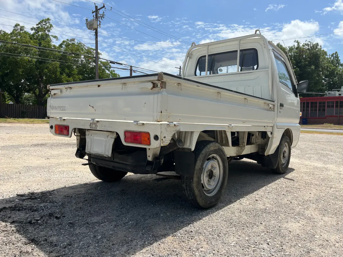 1992 Suzuki Carry, 4WD + AC, a Kei Truck, for sale at Sunshine Imports in Austin, TX (photo 4 of 10)