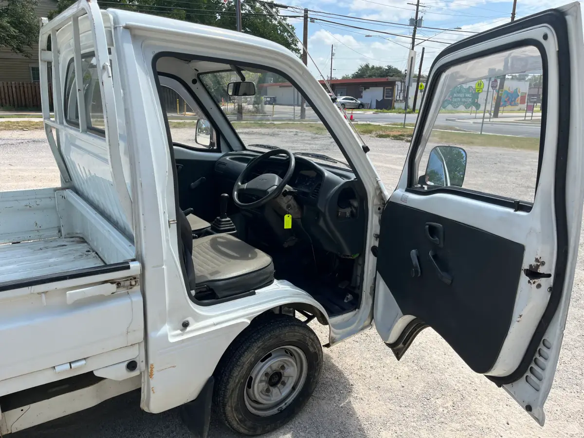 1992 Suzuki Carry, 4WD + AC, a Kei Truck, for sale at Sunshine Imports in Austin, TX (photo 5 of 10)