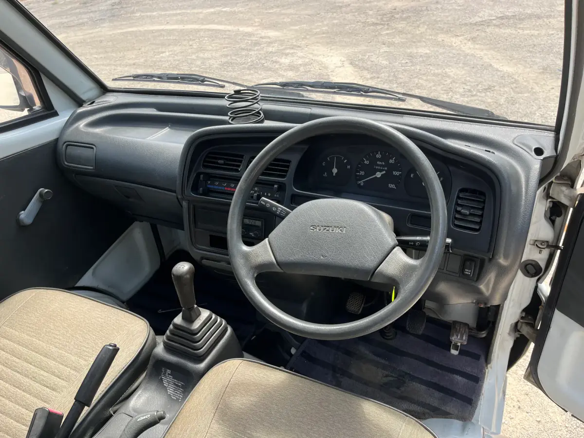 1992 Suzuki Carry, 4WD + AC, a Kei Truck, for sale at Sunshine Imports in Austin, TX (photo 6 of 10)