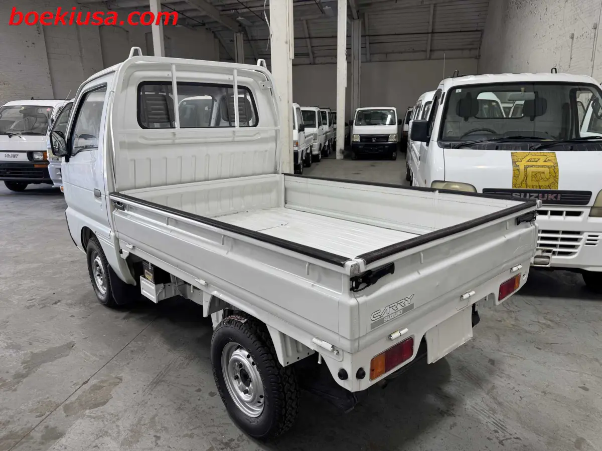 1992 Suzuki Carry 4x4, a white Kei Truck, for sale at Boeki USA in Paterson, NJ (photo 3 of 20)