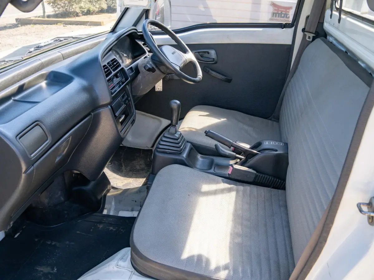1992 Suzuki Carry, a white Kei Truck, for sale at Japan Direct Motors in Irmo, SC (photo 13 of 13)
