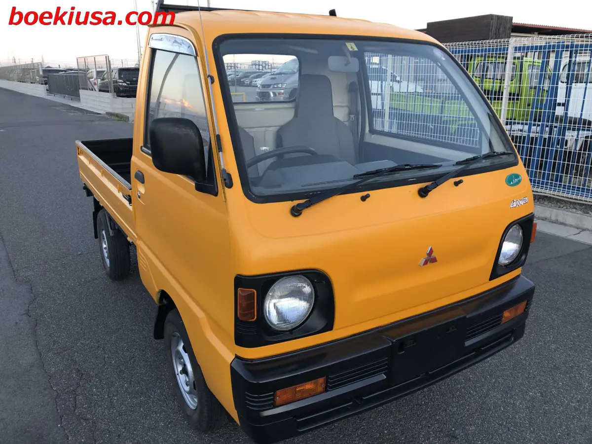 1993 Mitsubishi Minicab 4x4, a yellow ii Kei Truck, for sale at Boeki USA in Paterson, NJ (photo 1 of 20)