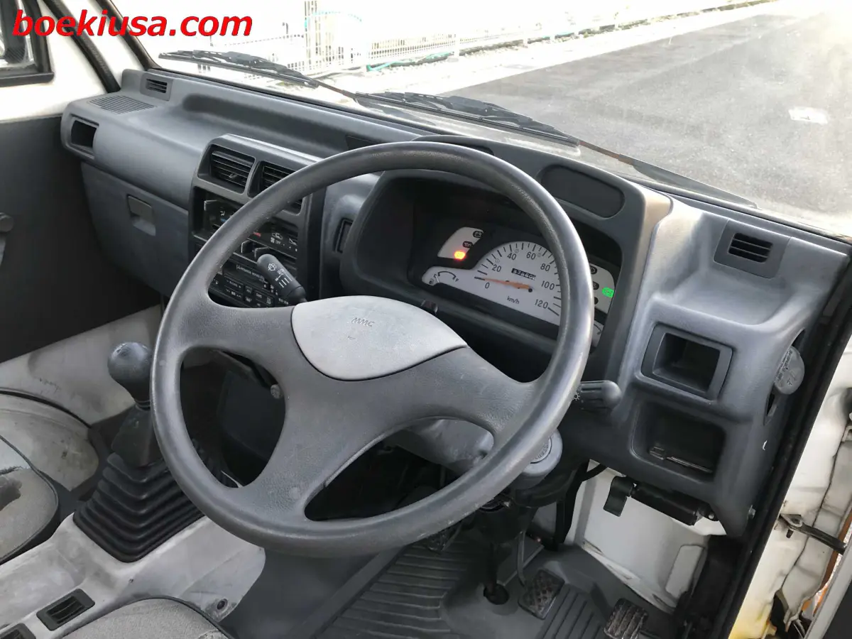 1993 Mitsubishi Minicab 4x4, a yellow ii Kei Truck, for sale at Boeki USA in Paterson, NJ (photo 13 of 20)