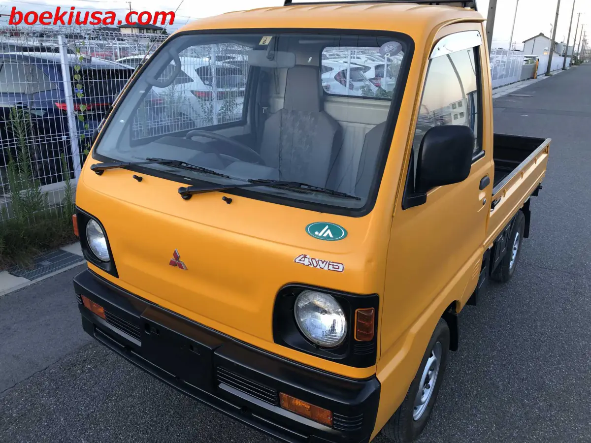 1993 Mitsubishi Minicab 4x4, a yellow ii Kei Truck, for sale at Boeki USA in Paterson, NJ (photo 2 of 20)