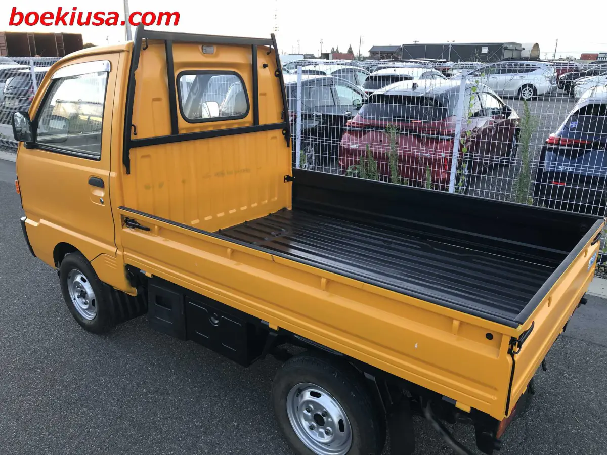 1993 Mitsubishi Minicab 4x4, a yellow ii Kei Truck, for sale at Boeki USA in Paterson, NJ (photo 3 of 20)