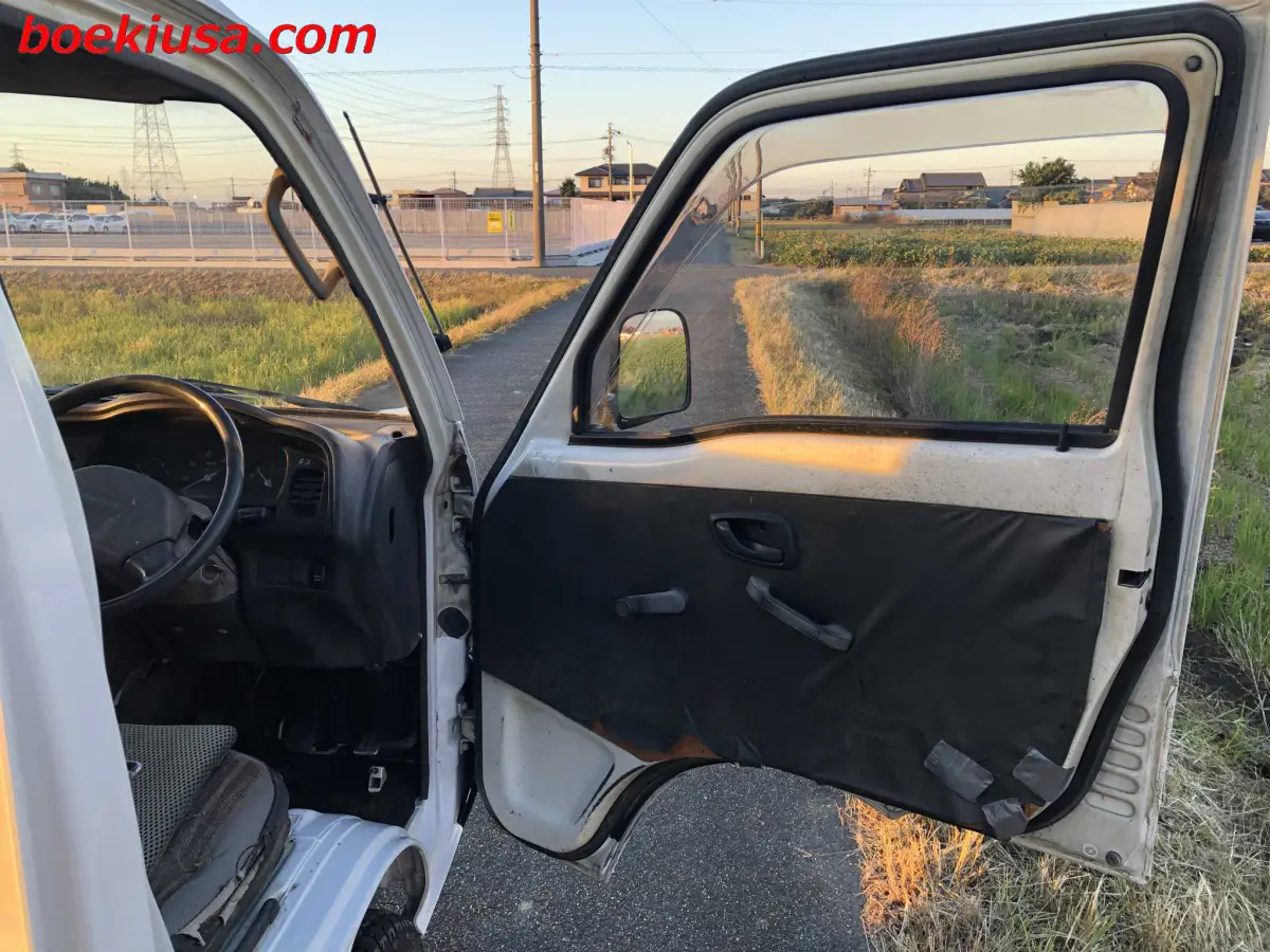 1993 Suzuki Carry Dump 4x4, a white Kei Truck, for sale at Boeki USA in Paterson, NJ (photo 10 of 20)