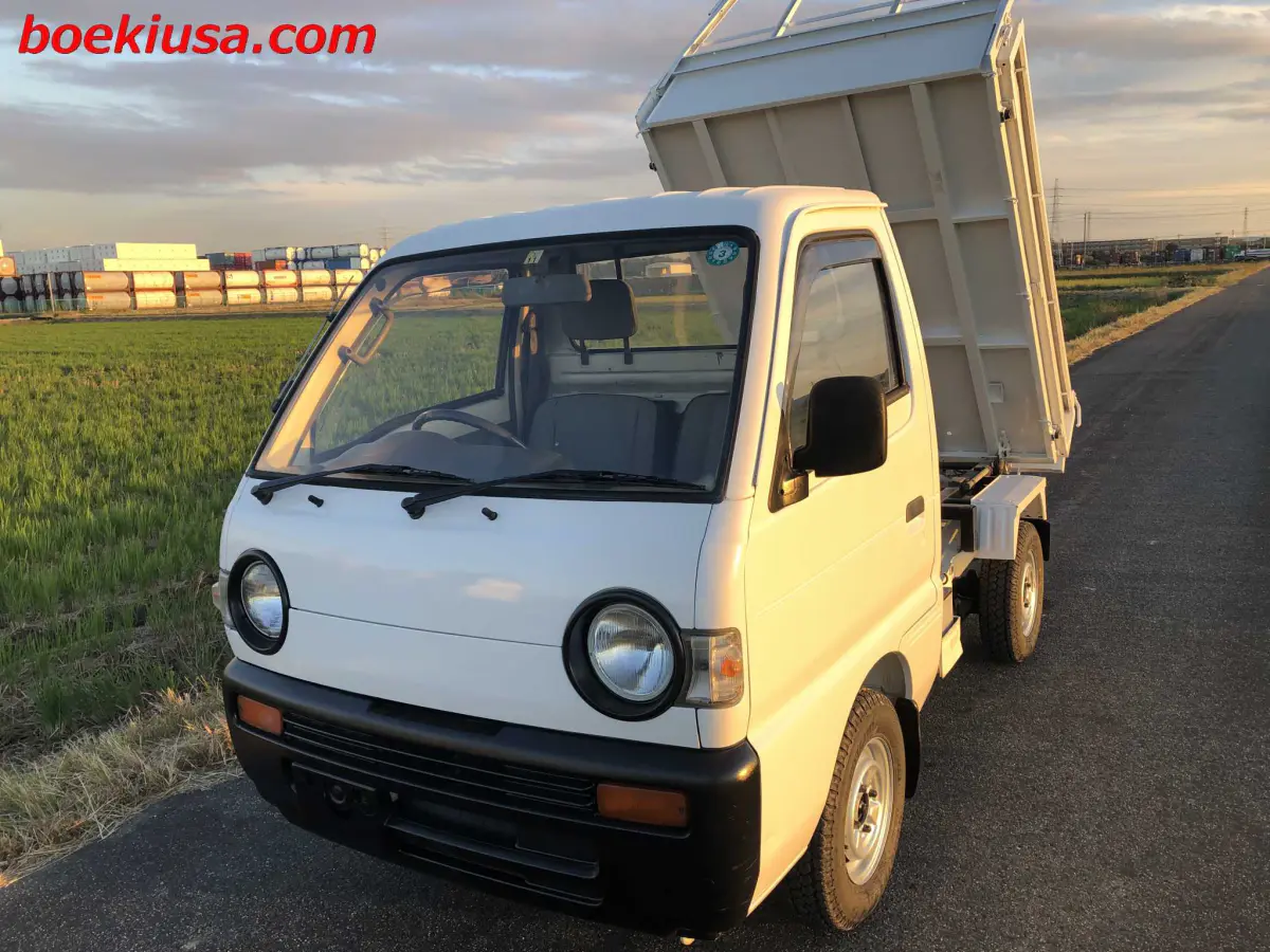 1993 Suzuki Carry Dump 4x4, a white Kei Truck, for sale at Boeki USA in Paterson, NJ (photo 2 of 20)