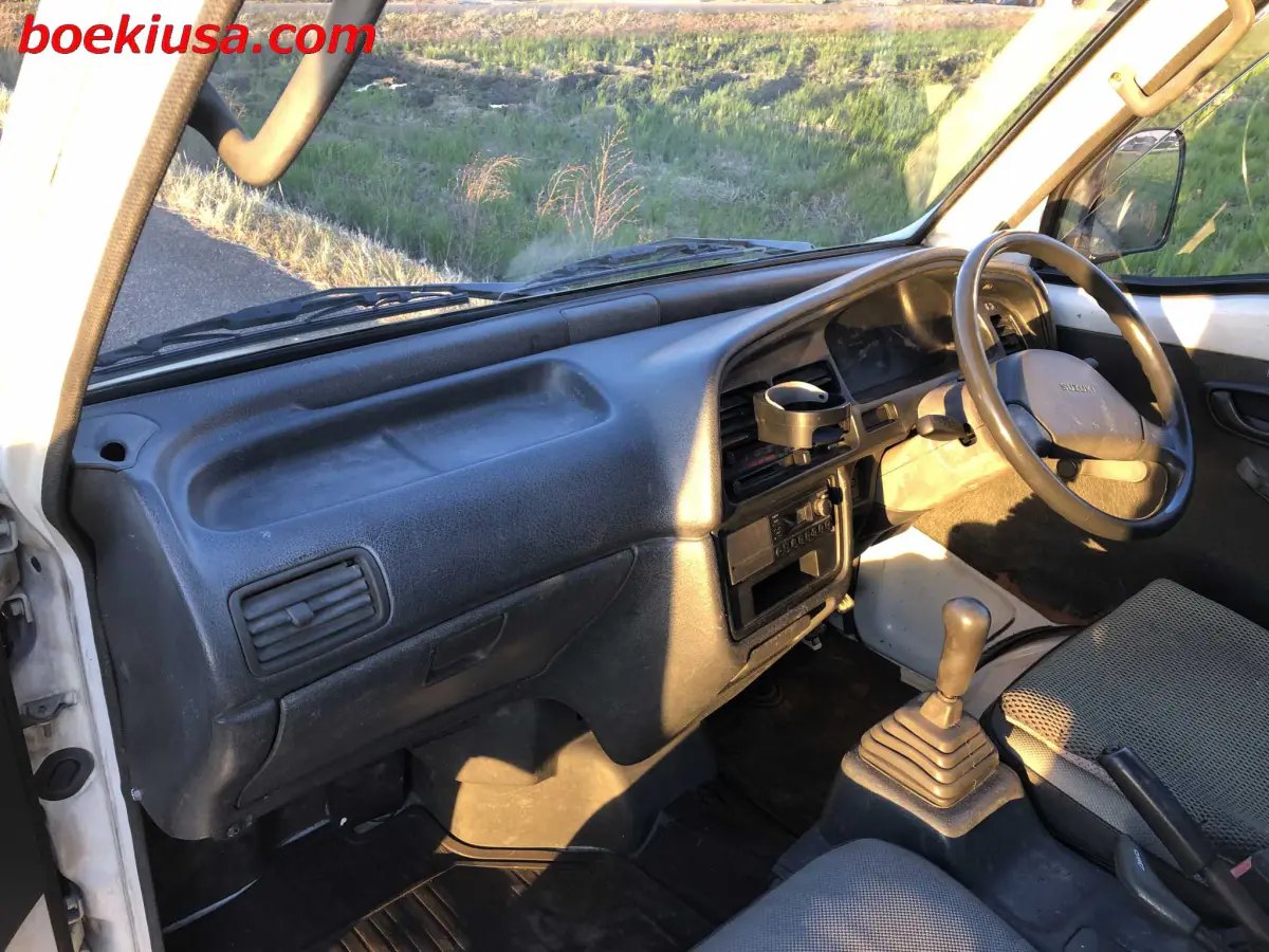 1993 Suzuki Carry Dump 4x4, a white Kei Truck, for sale at Boeki USA in Paterson, NJ (photo 7 of 20)