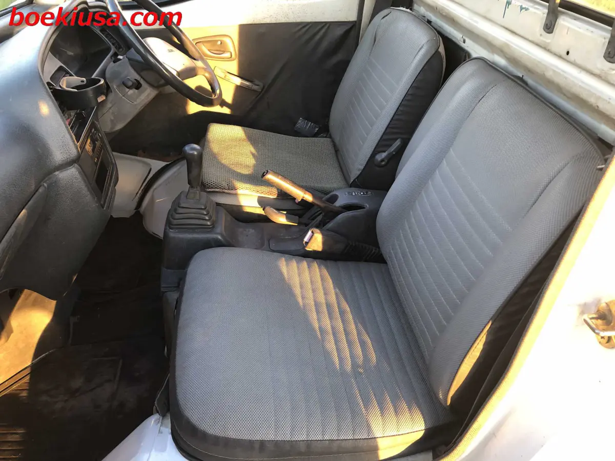 1993 Suzuki Carry Dump 4x4, a white Kei Truck, for sale at Boeki USA in Paterson, NJ (photo 8 of 20)