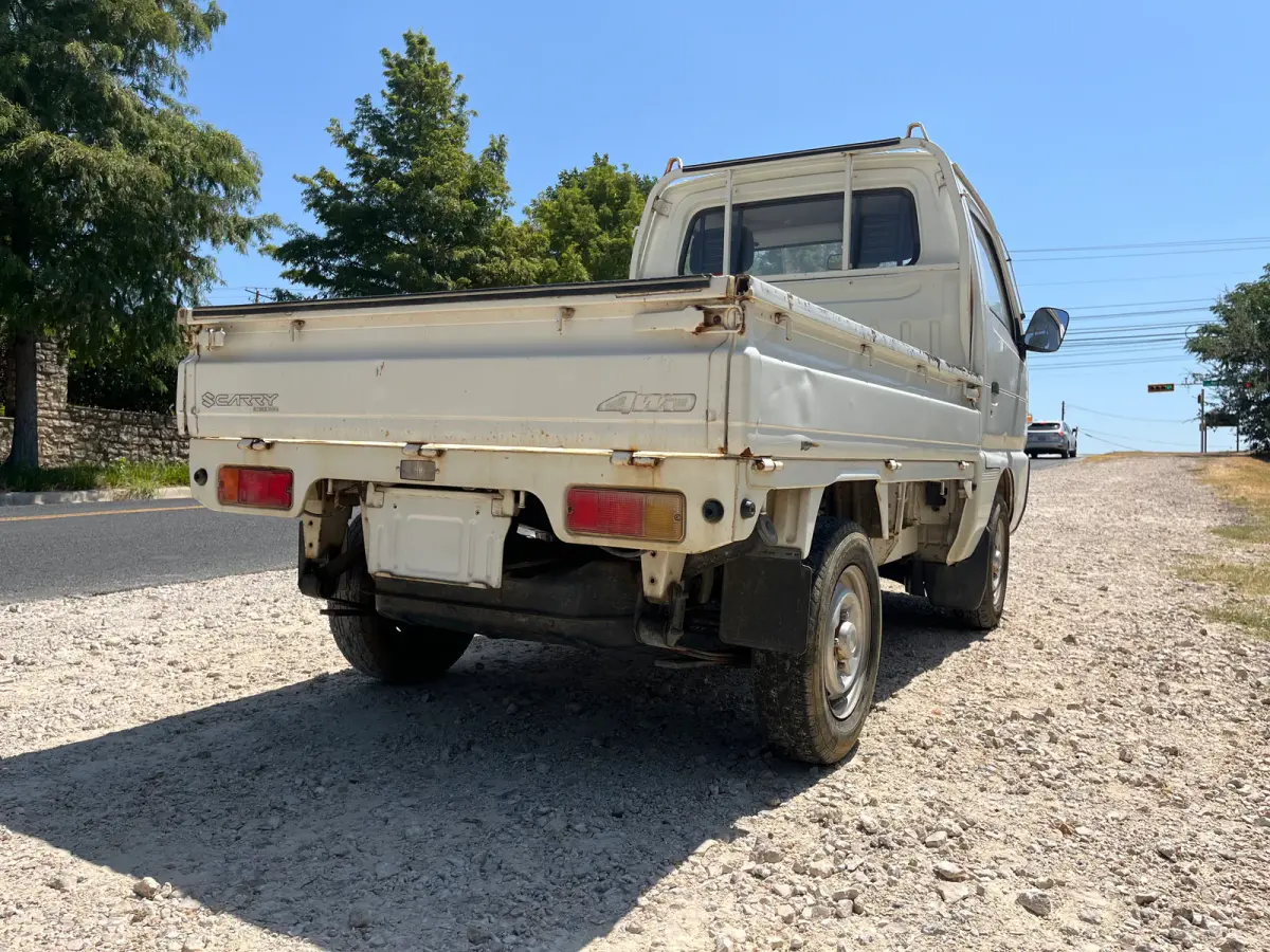 1994 Suzuki Carry, 4WD, a Kei Truck, for sale at Sunshine Imports in Austin, TX (photo 4 of 13)