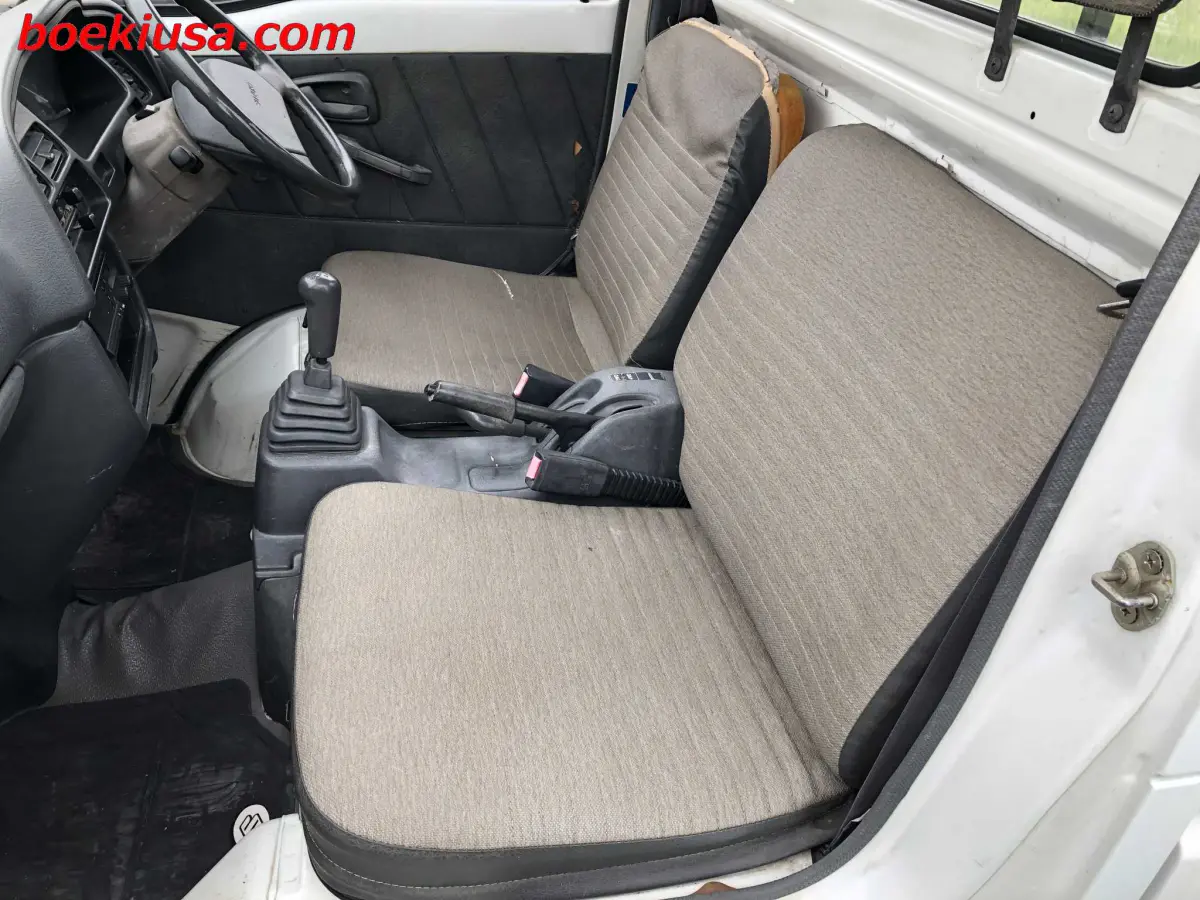 1994 Suzuki Carry 4x4, a white Kei Truck, for sale at Boeki USA in Paterson, NJ (photo 10 of 20)