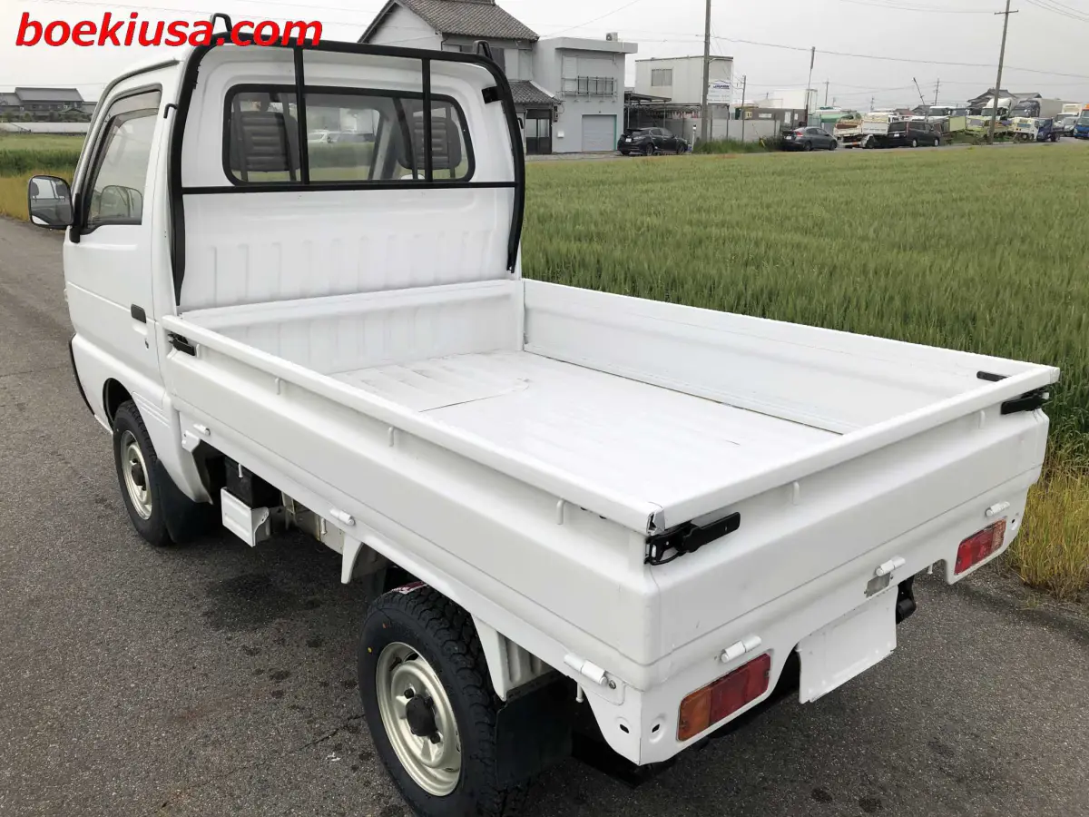 1994 Suzuki Carry 4x4, a white Kei Truck, for sale at Boeki USA in Paterson, NJ (photo 3 of 20)