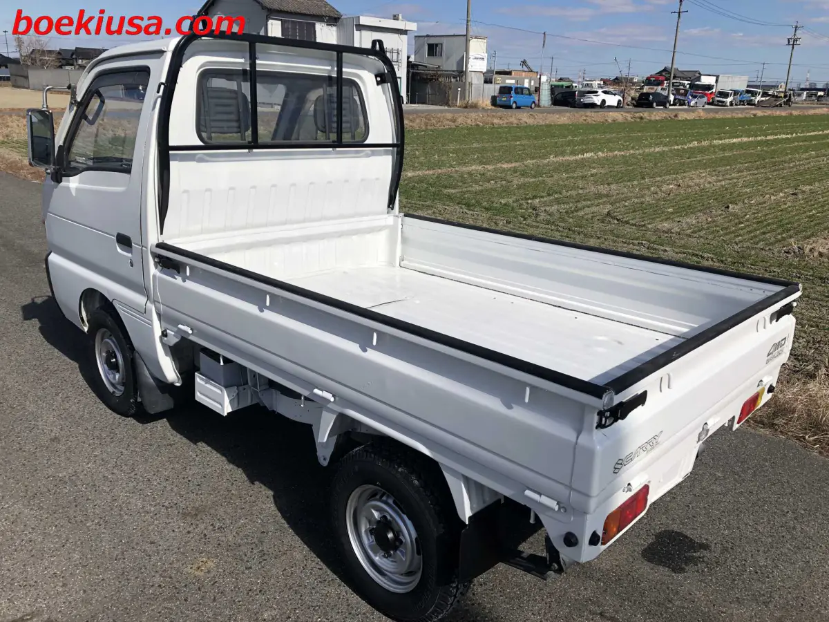 1994 Suzuki Carry 4x4, a white Kei Truck, for sale at Boeki USA in Paterson, NJ (photo 3 of 20)