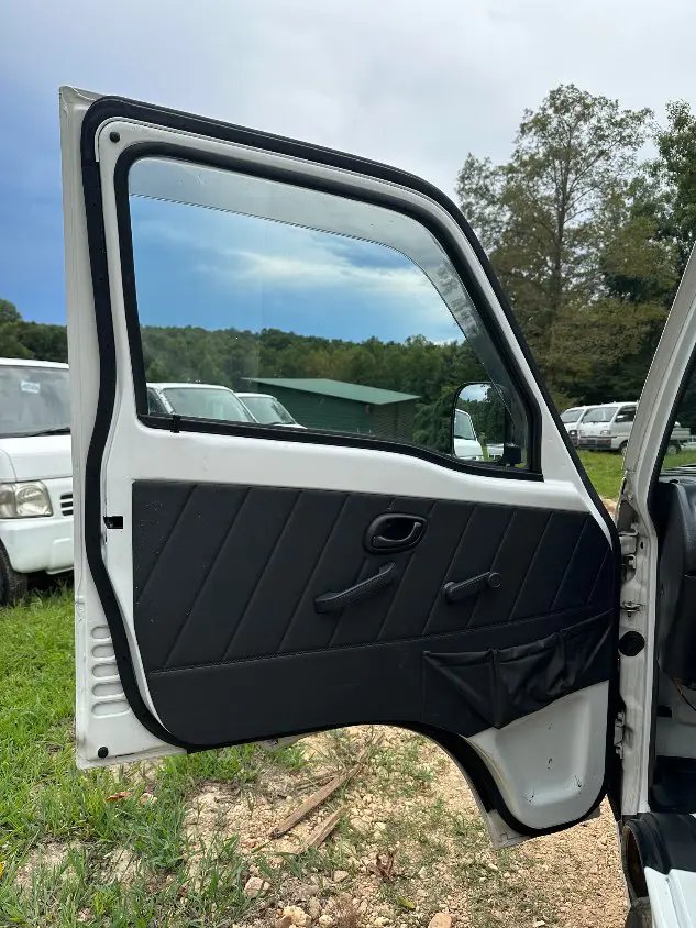 1995 Suzuki Carry 4WD, a white Kei Truck, for sale at Mayberry Mini Trucks in Mount Airy, NC (photo 15 of 20)