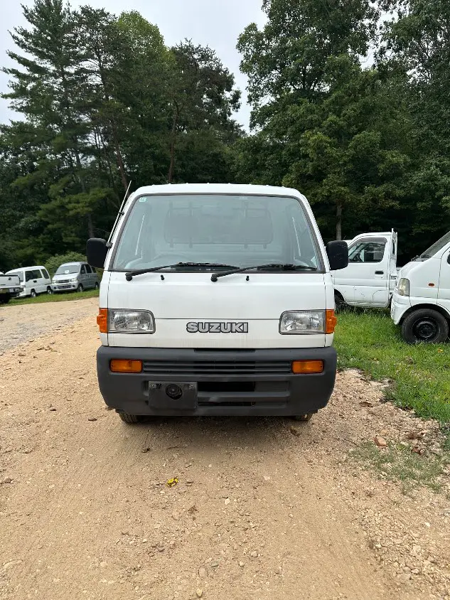 1995 Suzuki Carry 4WD, a white Kei Truck, for sale at Mayberry Mini Trucks in Mount Airy, NC (photo 4 of 20)