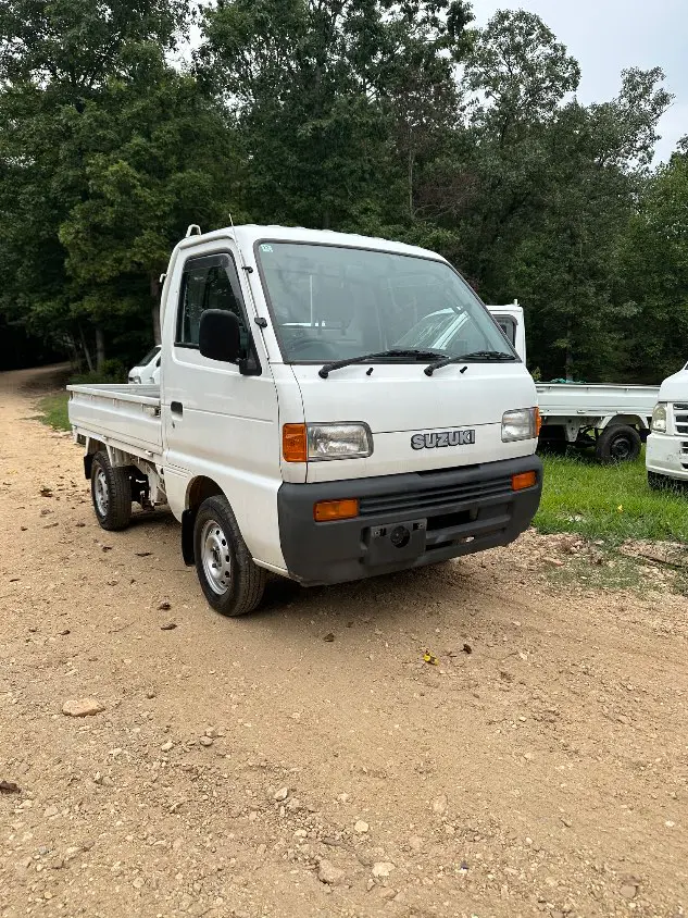 1995 Suzuki Carry 4WD, a white Kei Truck, for sale at Mayberry Mini Trucks in Mount Airy, NC (photo 5 of 20)
