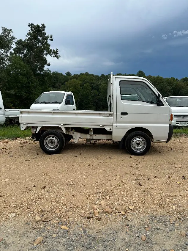 1995 Suzuki Carry 4WD, a white Kei Truck, for sale at Mayberry Mini Trucks in Mount Airy, NC (photo 6 of 20)