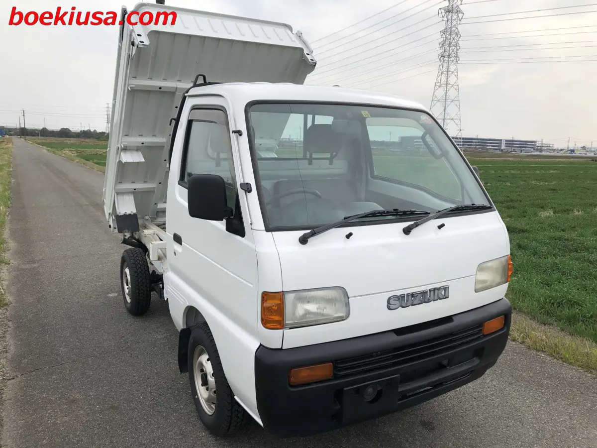 1995 Suzuki Carry Dump 4x4, a white Kei Truck, for sale at Boeki USA in Paterson, NJ (photo 1 of 20)