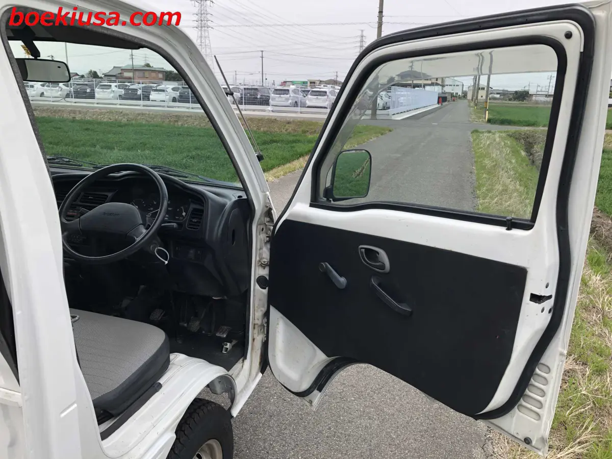 1995 Suzuki Carry Dump 4x4, a white Kei Truck, for sale at Boeki USA in Paterson, NJ (photo 12 of 20)