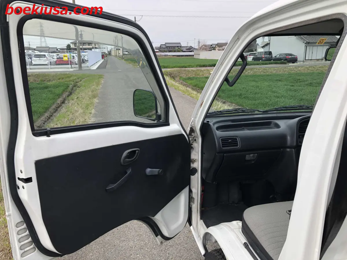 1995 Suzuki Carry Dump 4x4, a white Kei Truck, for sale at Boeki USA in Paterson, NJ (photo 8 of 20)