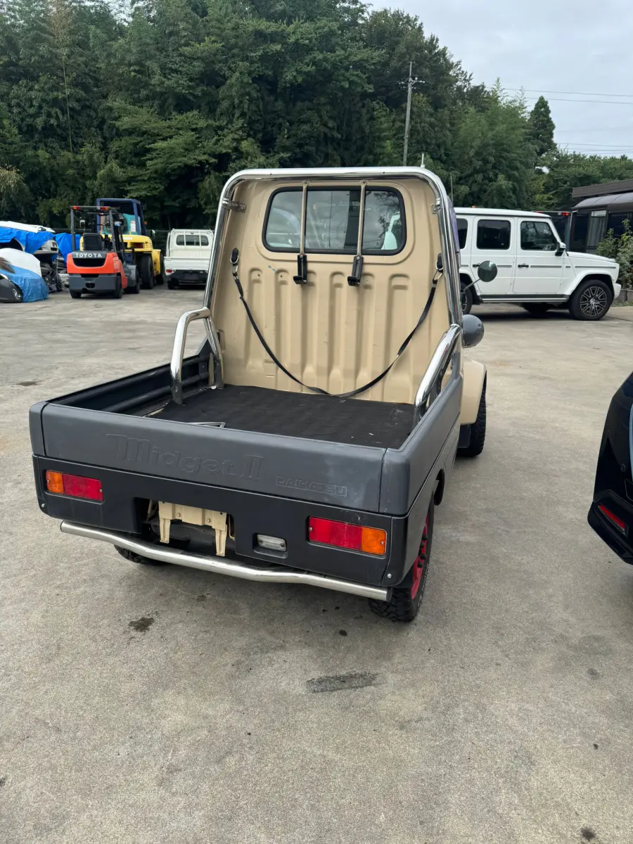 1996 Daihatsu Midget II, a beige Kei Truck, for sale at Skyline Kei Trucks in Houston, TX (photo 4 of 8)