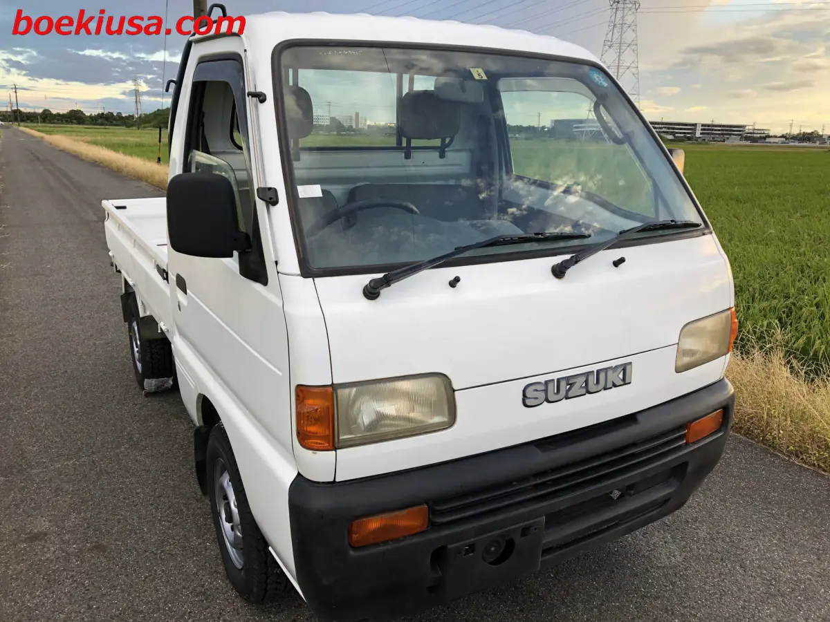 1996 Suzuki Carry 4x4, a white Kei Truck, for sale at Boeki USA in Paterson, NJ (photo 1 of 20)