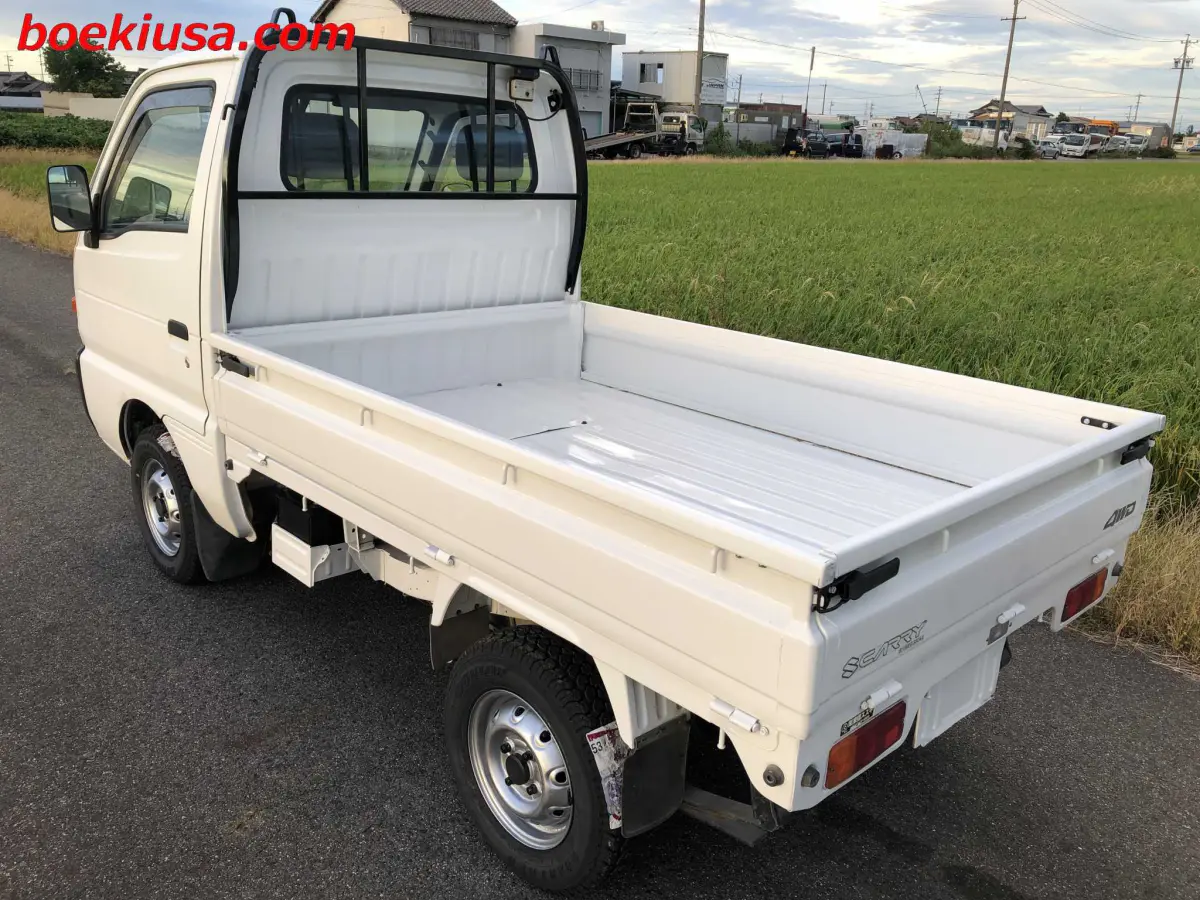 1996 Suzuki Carry 4x4, a white Kei Truck, for sale at Boeki USA in Paterson, NJ (photo 3 of 20)