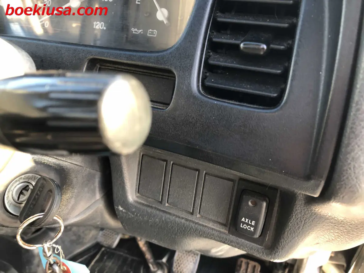 1996 Suzuki Carry 4x4, a white Kei Truck, for sale at Boeki USA in Paterson, NJ (photo 16 of 20)