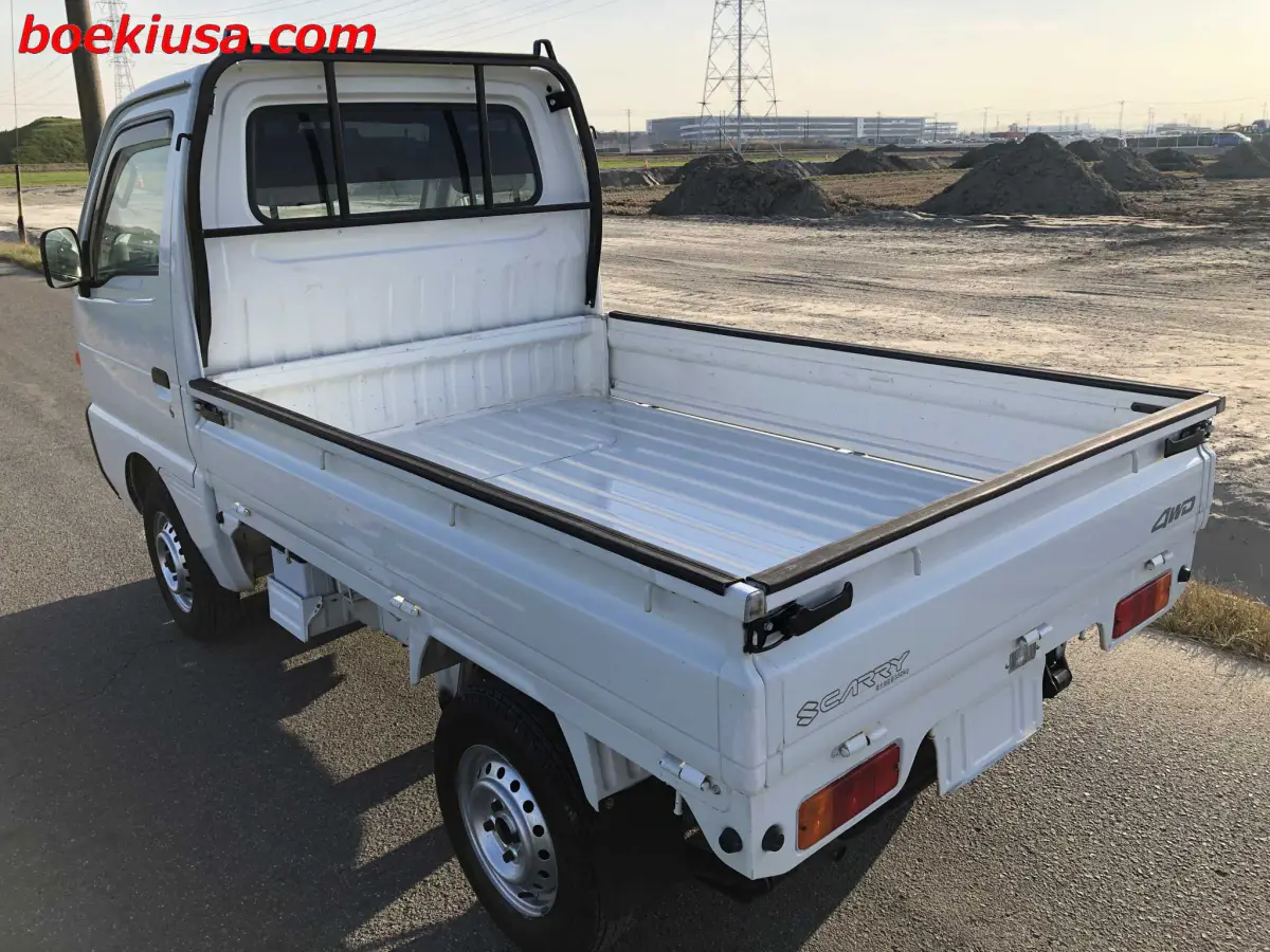 1996 Suzuki Carry 4x4, a white Kei Truck, for sale at Boeki USA in Paterson, NJ (photo 3 of 20)