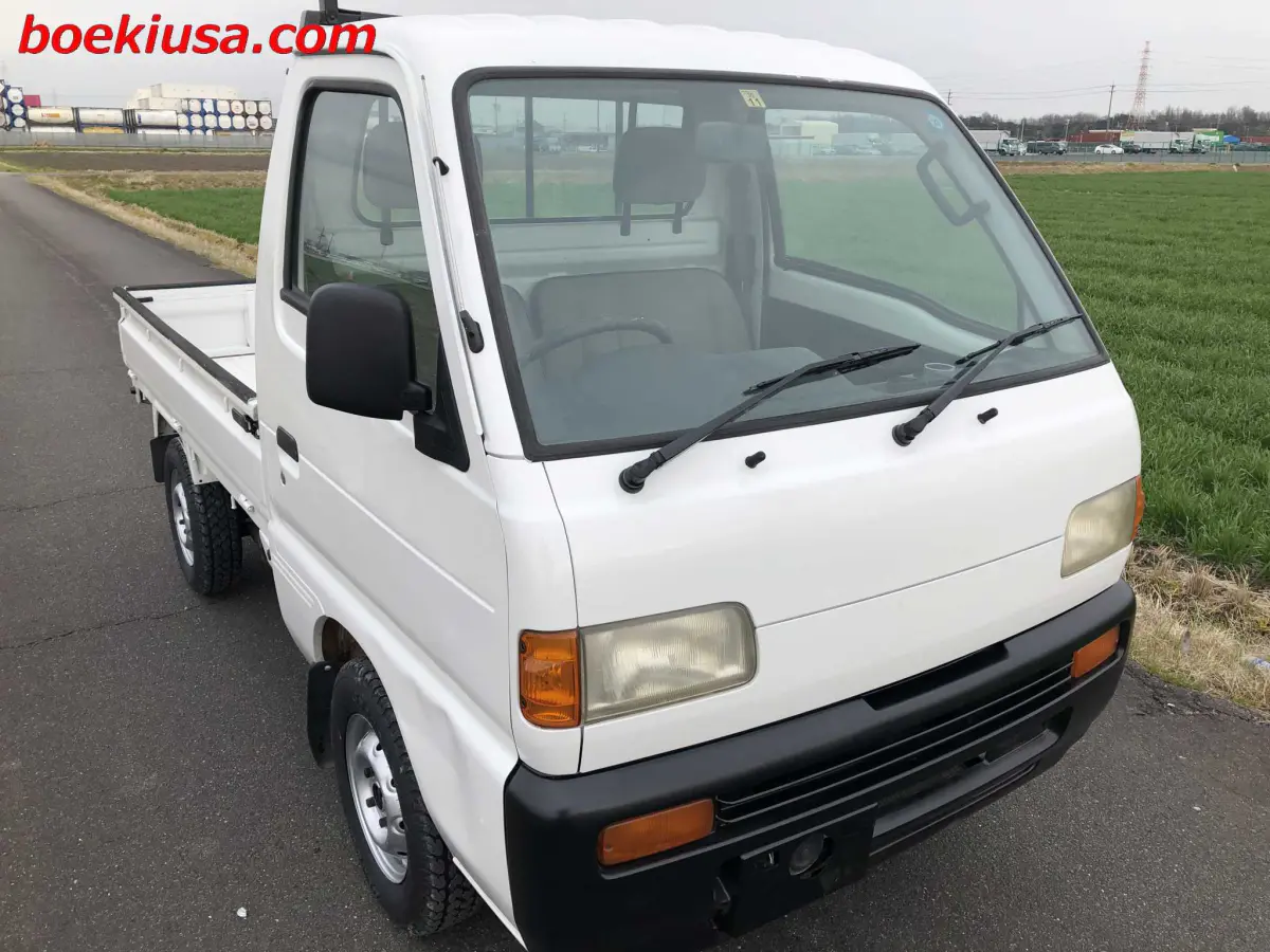 1996 Suzuki Carry 4x4, a white Kei Truck, for sale at Boeki USA in Paterson, NJ (photo 1 of 20)