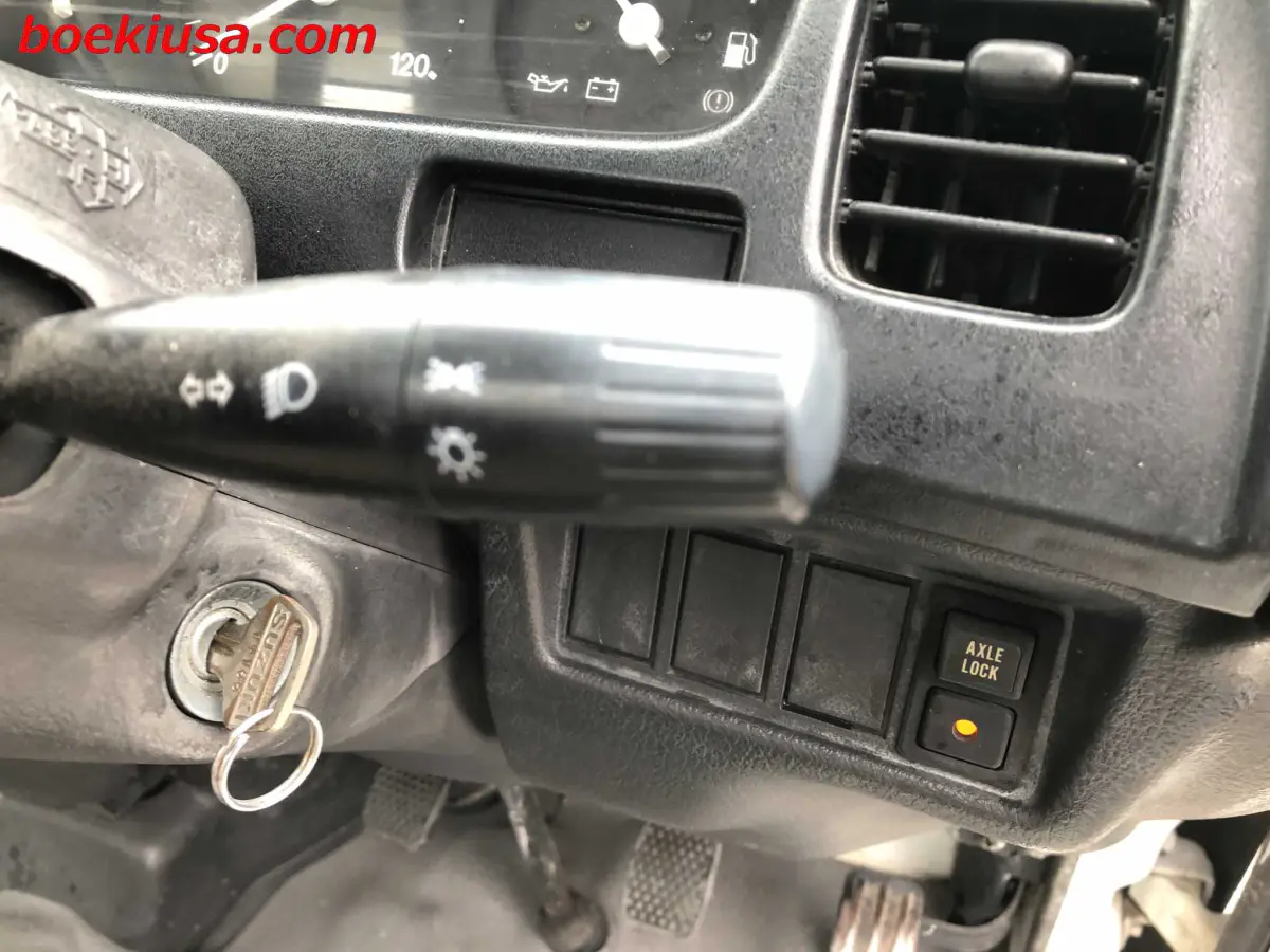 1996 Suzuki Carry 4x4, a white Kei Truck, for sale at Boeki USA in Paterson, NJ (photo 16 of 20)