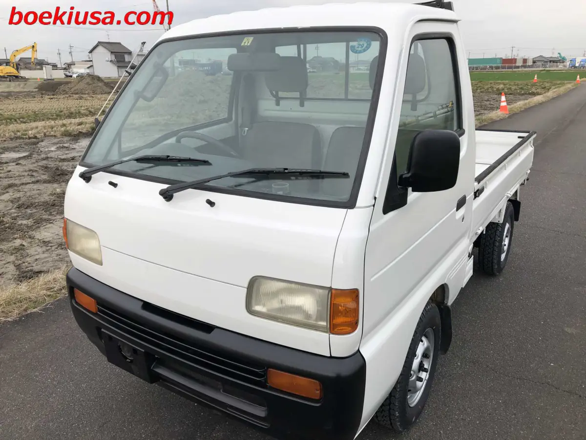 1996 Suzuki Carry 4x4, a white Kei Truck, for sale at Boeki USA in Paterson, NJ (photo 2 of 20)