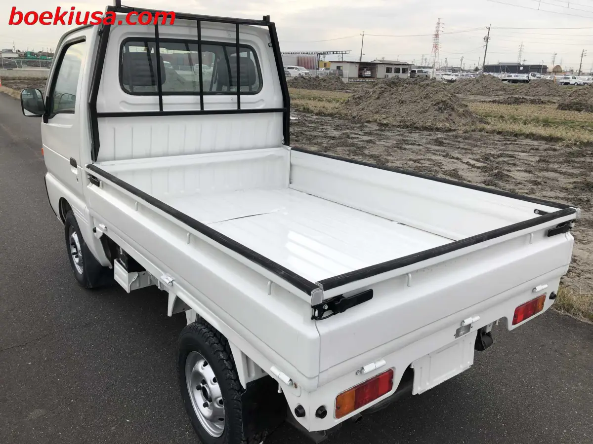 1996 Suzuki Carry 4x4, a white Kei Truck, for sale at Boeki USA in Paterson, NJ (photo 3 of 20)