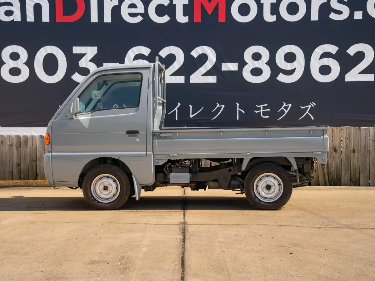 1996 Suzuki Carry, a gray Kei Truck, for sale at Japan Direct Motors in Irmo, SC (photo 10 of 13)