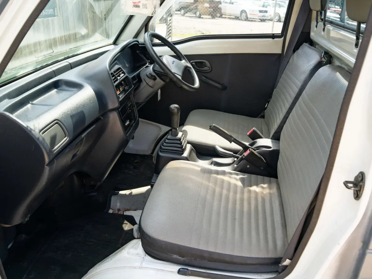 1996 Suzuki Carry, a gray Kei Truck, for sale at Japan Direct Motors in Irmo, SC (photo 12 of 13)