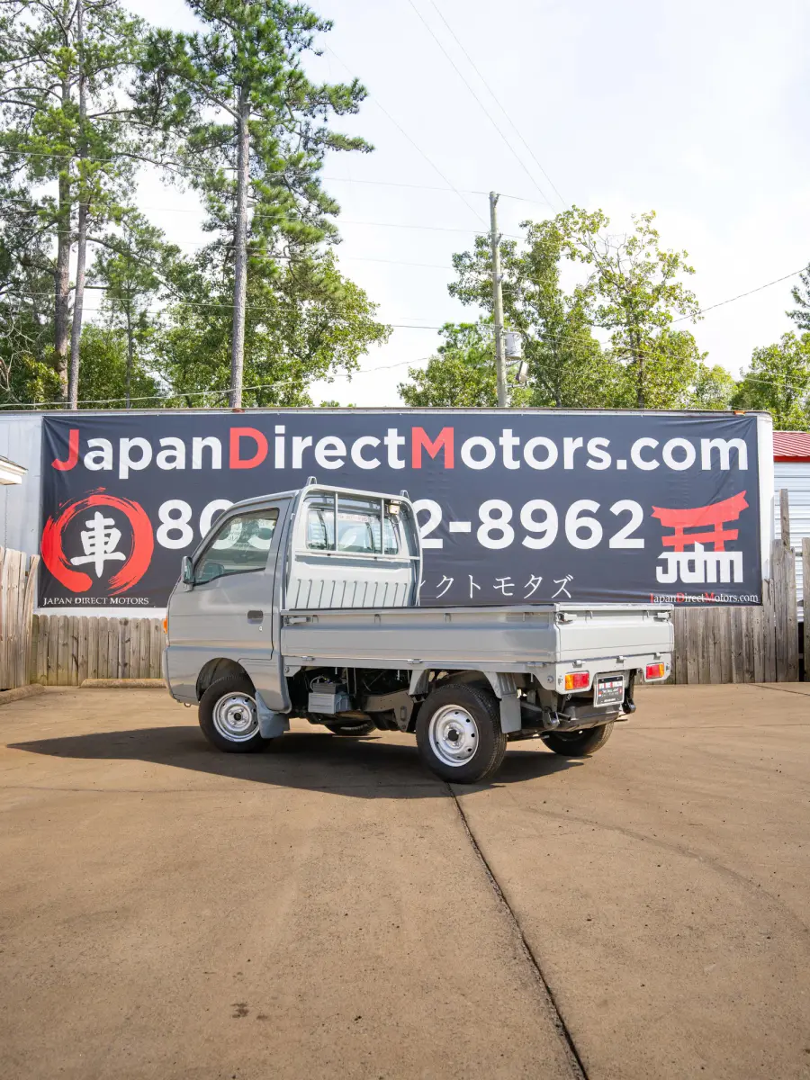 1996 Suzuki Carry, a gray Kei Truck, for sale at Japan Direct Motors in Irmo, SC (photo 2 of 13)