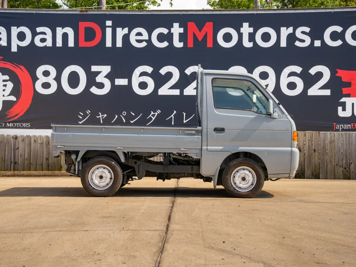1996 Suzuki Carry, a gray Kei Truck, for sale at Japan Direct Motors in Irmo, SC (photo 6 of 13)