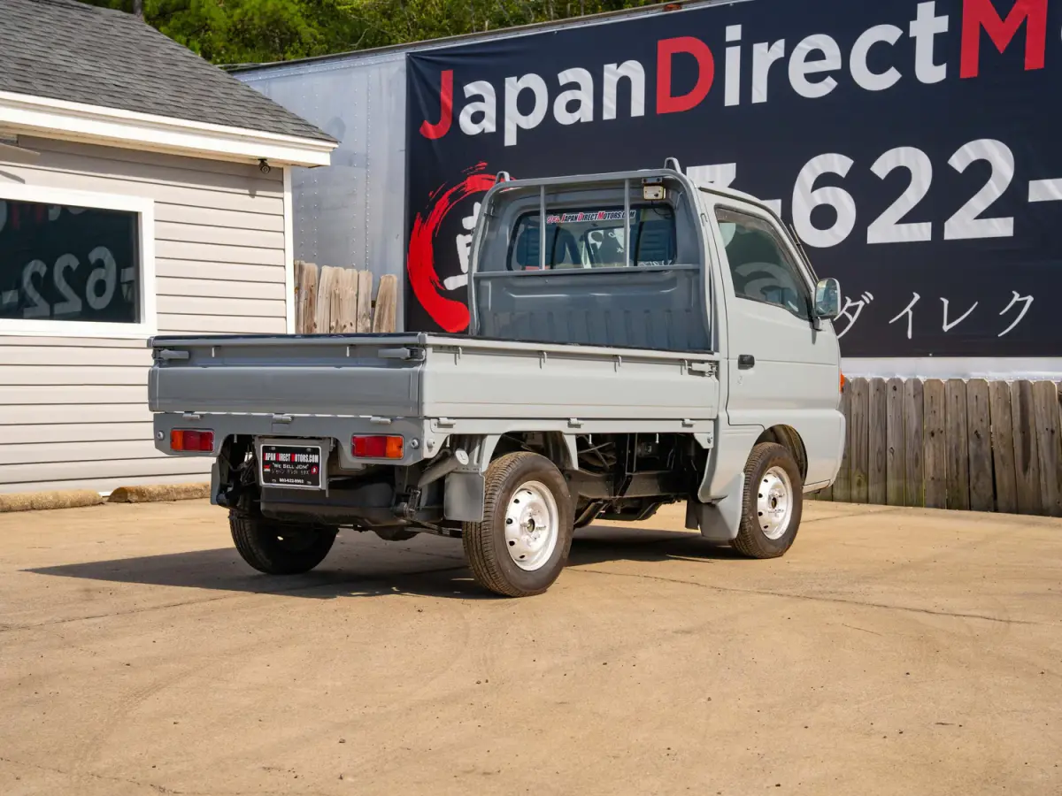 1996 Suzuki Carry, a gray Kei Truck, for sale at Japan Direct Motors in Irmo, SC (photo 7 of 13)