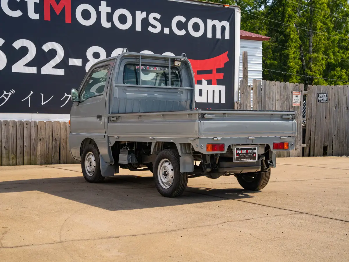 1996 Suzuki Carry, a gray Kei Truck, for sale at Japan Direct Motors in Irmo, SC (photo 9 of 13)