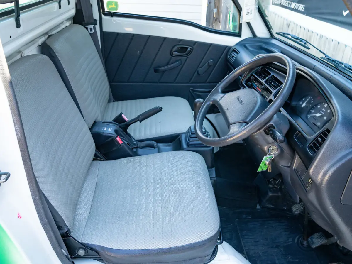 1996 Suzuki Carry, a green Kei Truck, for sale at Japan Direct Motors in Irmo, SC (photo 11 of 16)
