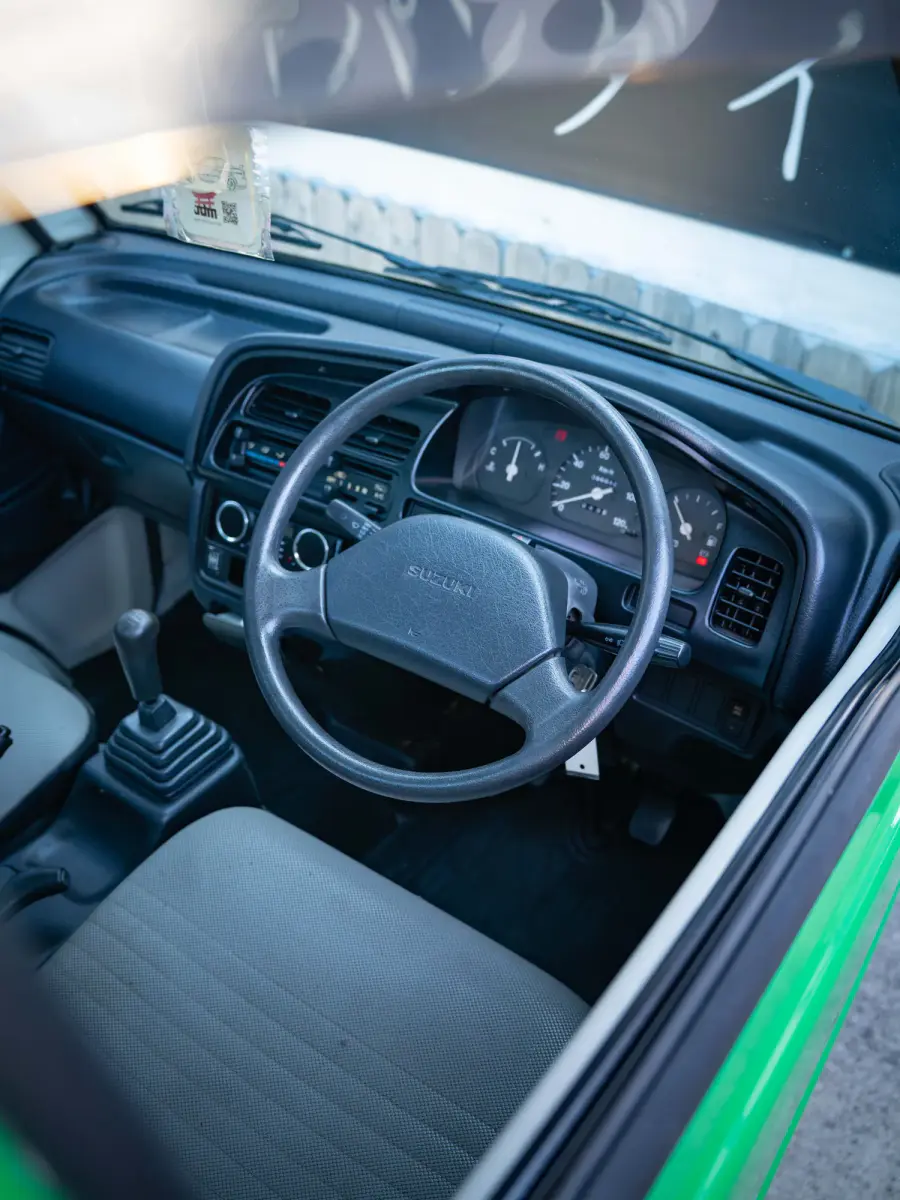 1996 Suzuki Carry, a green Kei Truck, for sale at Japan Direct Motors in Irmo, SC (photo 16 of 16)