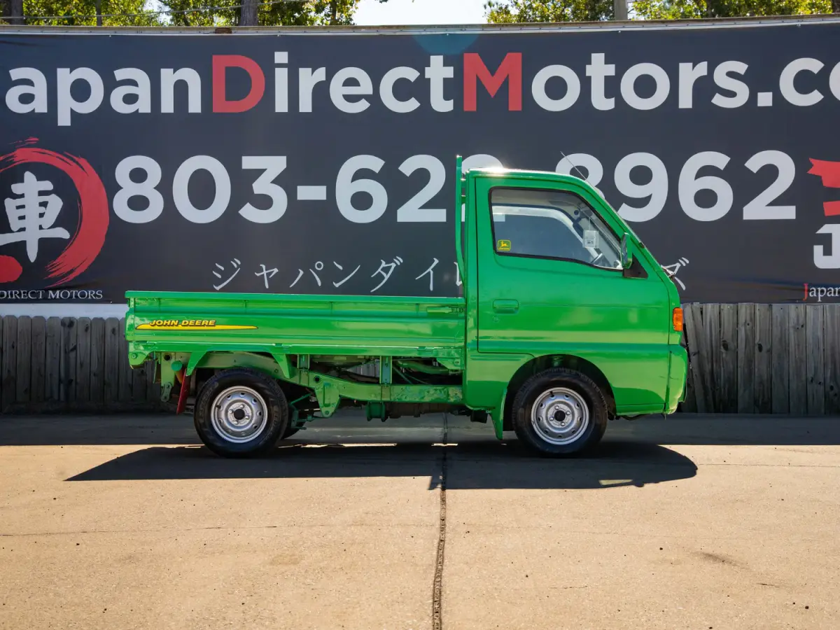 1996 Suzuki Carry, a green Kei Truck, for sale at Japan Direct Motors in Irmo, SC (photo 6 of 16)
