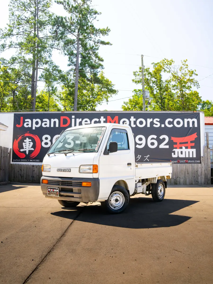 1997 Suzuki Carry 25k Miles, a white Kei Truck, for sale at Japan Direct Motors in Irmo, SC (photo 1 of 13)