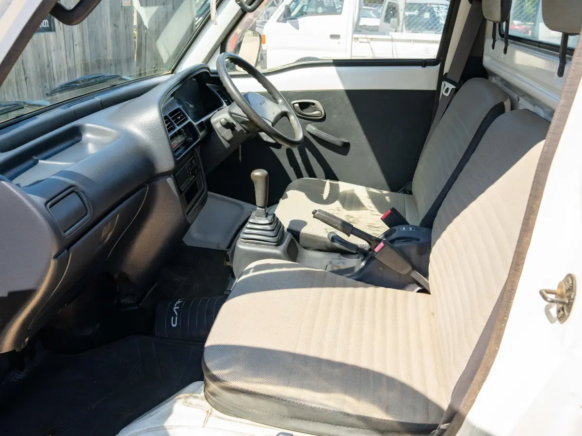 1997 Suzuki Carry 25k Miles, a white Kei Truck, for sale at Japan Direct Motors in Irmo, SC (photo 12 of 13)