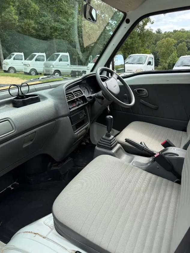 1997 Suzuki Carry 4WD, a white Kei Truck, for sale at Mayberry Mini Trucks in Mount Airy, NC (photo 11 of 18)